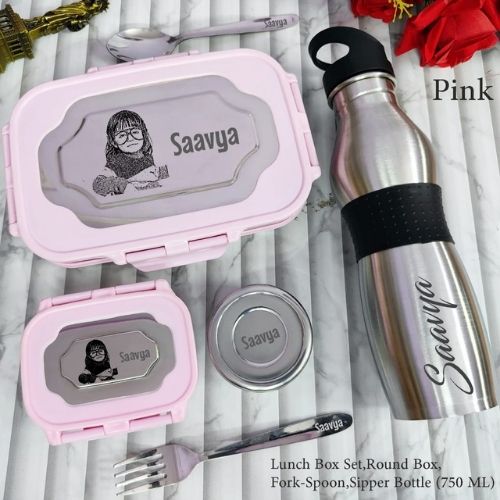 Pink lunch box set with 'Saavya' branding on a marble surface.