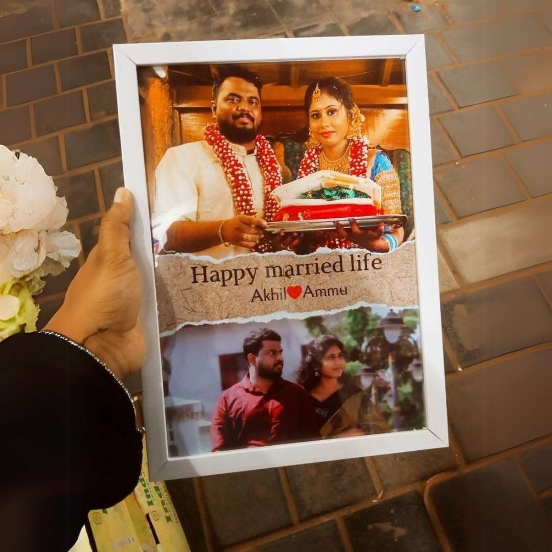 A personalized wedding photo frame with a picture of a couple, text 'Happy married life' and signatures 'Akshay & Annu'.