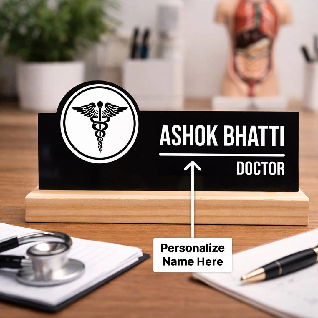 Personalized nameplate for a doctor on a desk with stethoscope and stationery.