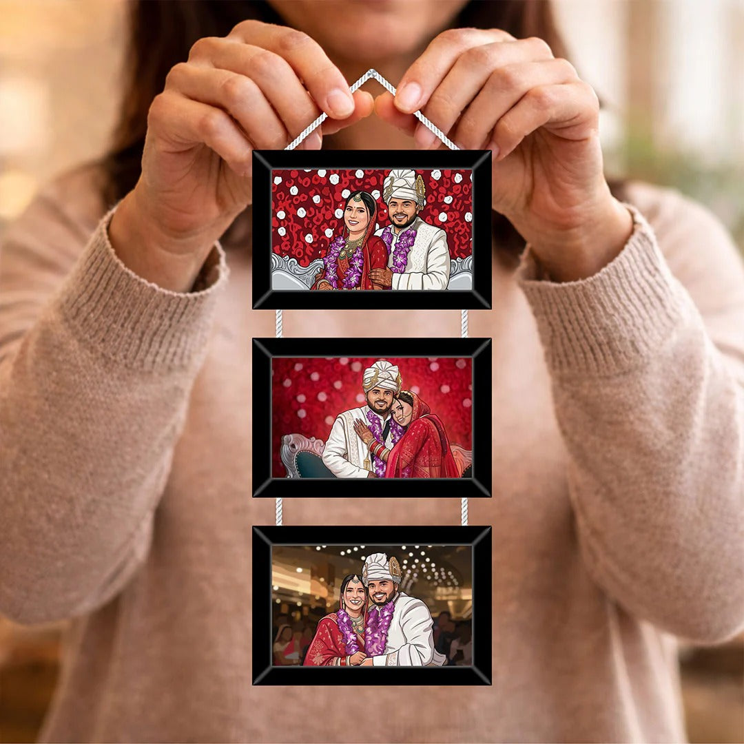Person holding a set of three framed pictures of a couple on a red background.