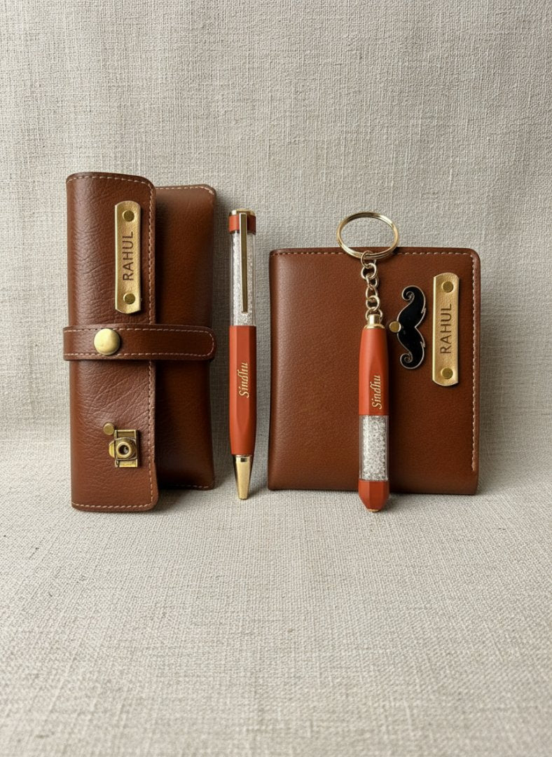 Brown leather case with gold accents, pen, and keychain set on a textured surface