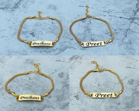 Bracelet rakhi with gold color with custom name , this rakhi is placed on floor ,size is adjustable 2 models available