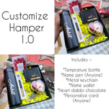 one bottle with custom name, and one black pen with custom name, and wallet and charm and name, love shape chocolate box, greeting card all are comes in one box.