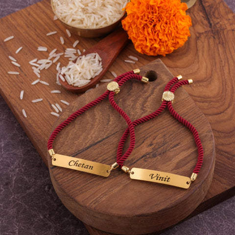Elegant maroon engraved Rakhi