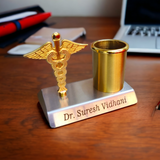 Customized Golden Pen Stand With Doctor
Logo -  Name Plate for Doctor - Best Gift For Doctors - Doctor Name Plate - Personalized Gift For Dr