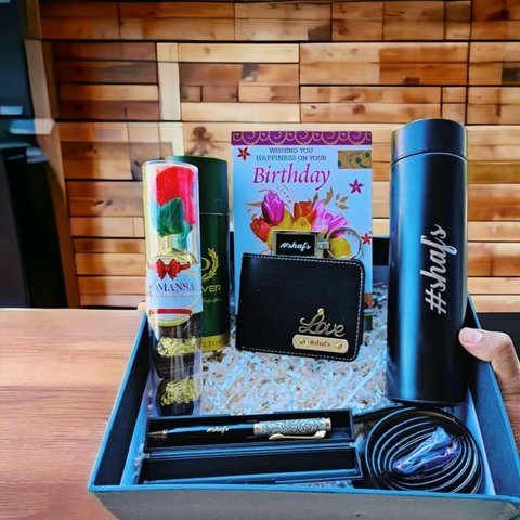 in black box there is belt, bottle, wallet with charm and name, one greeting card chocolate box denver perfume, ine pen one key chain all are customized with name