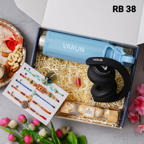 one blue color box is there and one head set with custom name and 5 models rakhi and one bottle with custom name one chocolate box and 2 small bottle glaas filled with chawal and roli