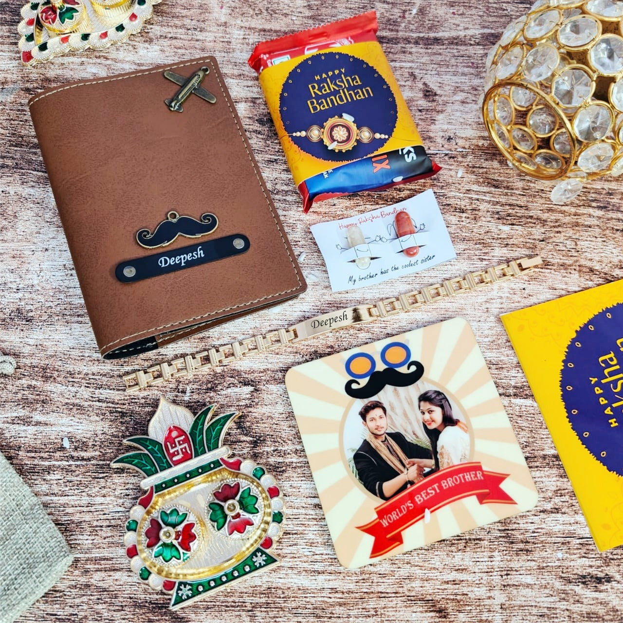  a Bangkok Leather passport cover, customized fridge magnet, Metal Rakhi 1.0, Rakhi theme chocolate, Roli Chawal, and a Roli Chawal platter. all are having customized option with name pasport with charm also avaiiable, all items are placed on floor
