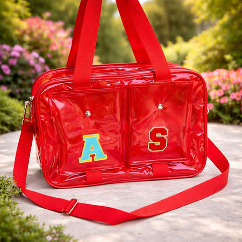 Red transparent bag with 'A' and 'S' letters on a garden background