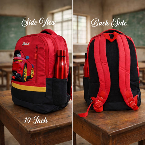 Red and black backpack with car design on a wooden desk in a classroom setting.