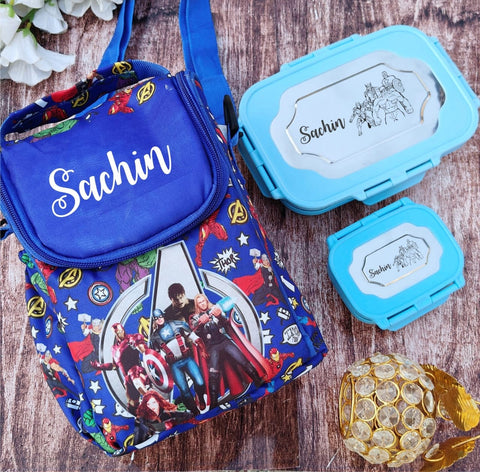 Colorful bag with superhero design and blue containers on a wooden surface