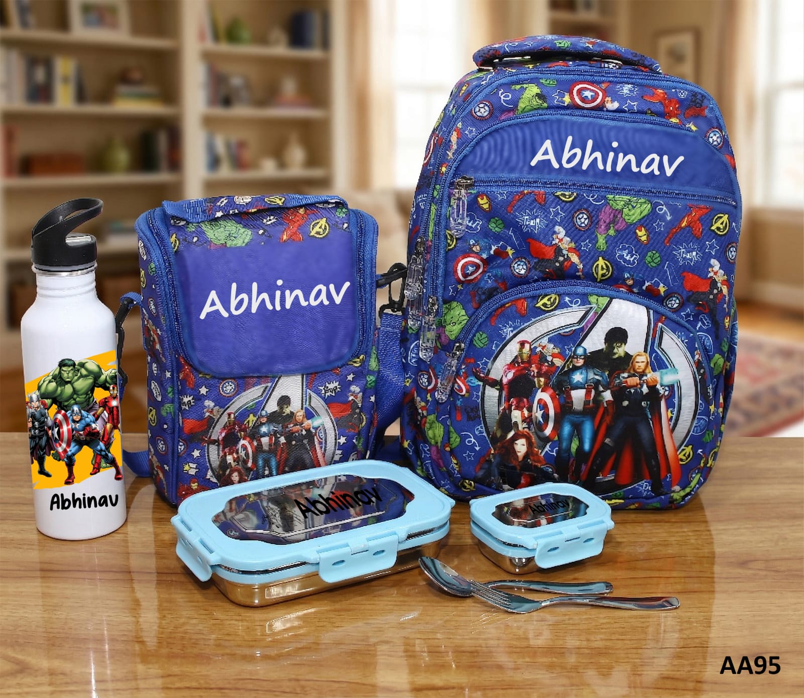 Blue superhero-themed backpack, lunch box, and water bottle with 'Abhinav' on a wooden surface.