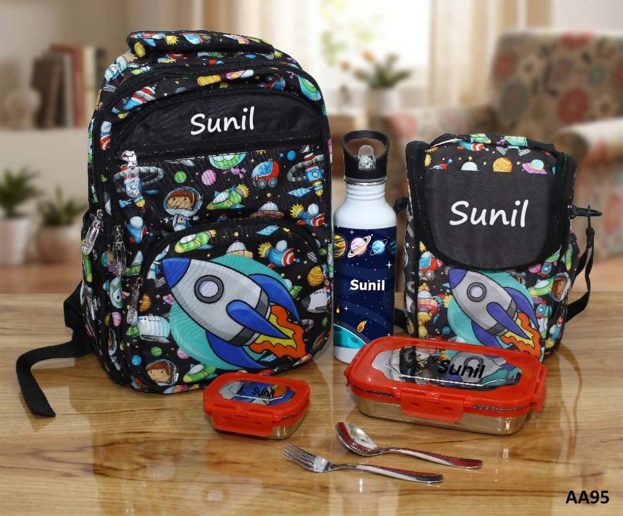 Backpack, water bottle, lunch box, and utensils with 'Sunil' branding on a wooden table.