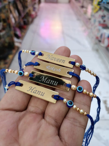 Evil Eye Rakhi with Custom Name on Brass Tile – Personalized Raksha Bandhan Gift