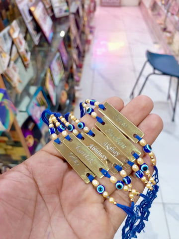 Evil Eye Rakhi with Custom Name on Brass Tile – Personalized Raksha Bandhan Gift