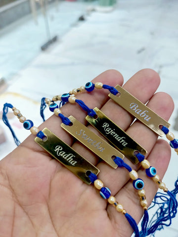 Evil Eye Rakhi with Custom Name on Brass Tile – Personalized Raksha Bandhan Gift