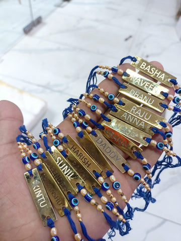 Evil Eye Rakhi with Custom Name on Brass Tile – Personalized Raksha Bandhan Gift