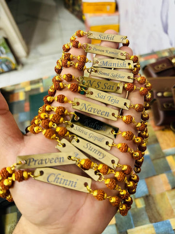 Rudraksha Rakhi with Custom Name on Golden Steel Tile – Adjustable Chain | Raksha Bandhan Gift
