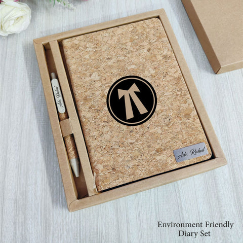 Cork diary set with pen in a box on a light wooden surface