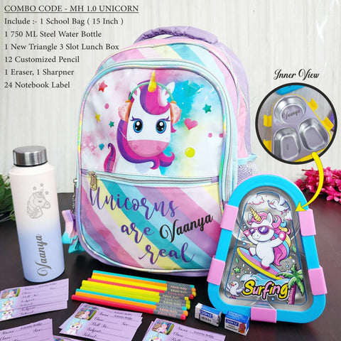 Backpack with unicorn design, water bottle, lunch box, and stationery items on a table.