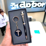 in black gift box one premium blac pen with doctor logo and custom name and in black pendent key chain with doctor symbol