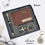 brown colored wallet eith custom name and charm ,black color pen with custom name and custom logo with keychain where back side can be customize, all are placed in black gift box