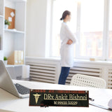 wooden customized office desk name plate with doctor logo, it is completly customized with name and phone number name plate plate placed in doctor cabin