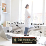 wooden customized office desk name plate with doctor logo, it is completly customized with name and phone number name plate plate placed in doctor cabin. explained about customization with using arrow like where we can add our deatils