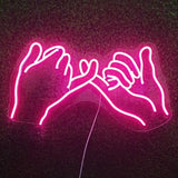 Couples hand neon light 